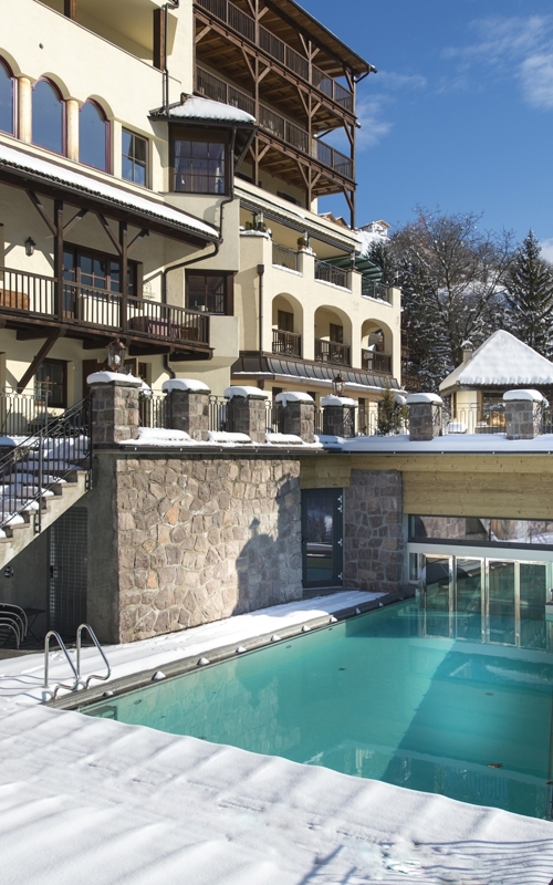 Hotel pool in winter with snow