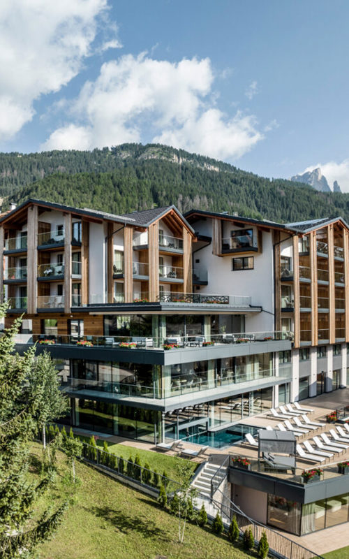 Modern hotel with pool & terrace in the mountains