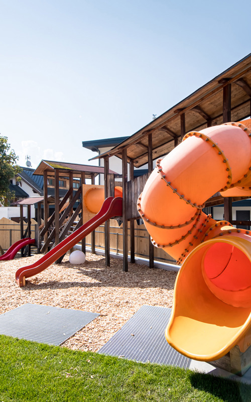 Children's playground with swing & slides