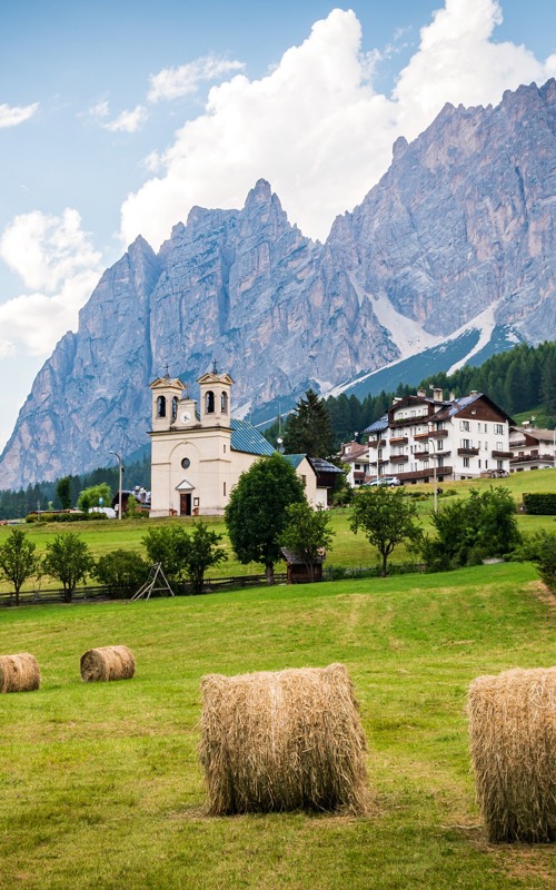 Hay balls, houses and mountains in Cortina d'Ampezzo